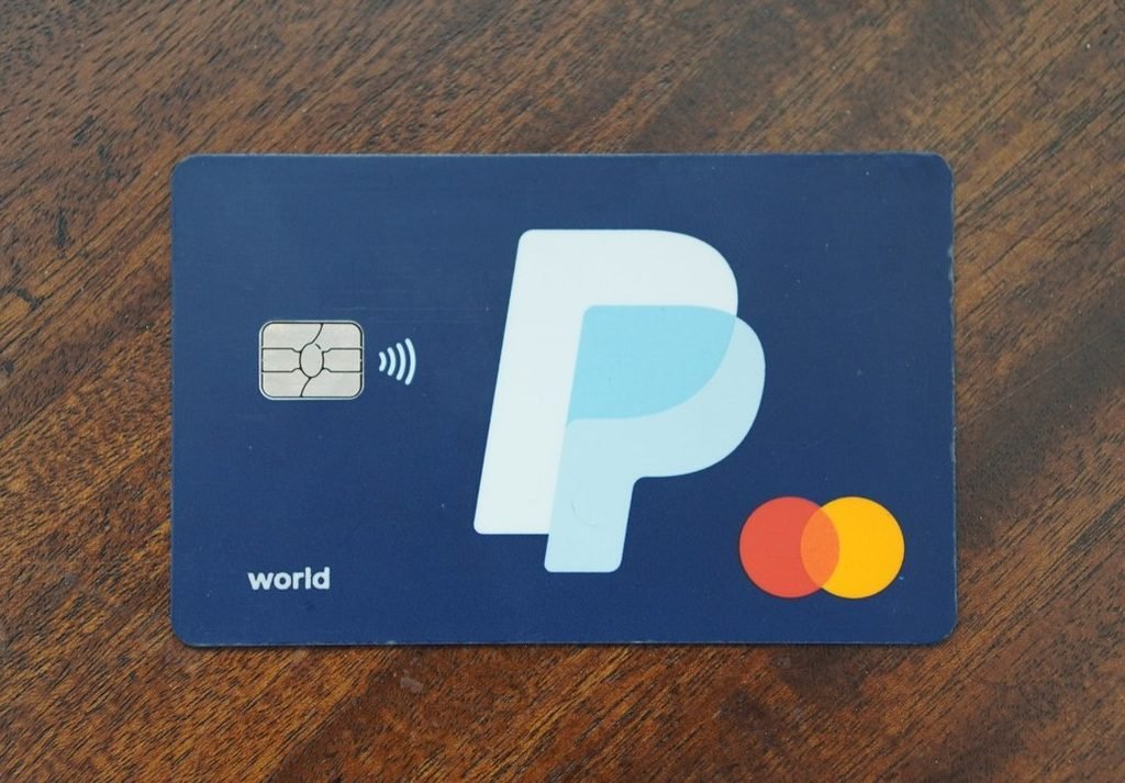 PayPal Cashback World Mastercard on a wooden table